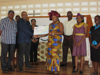 CGX Chairman Professor Suresh Narine (third from left) presents a $1,000,000 cheque to ACDA’s Executive Committee Member Aisha Jean-Baptiste in the presence of ACDA members and CGX staff. This donation is to assist ACDA in covering the costs of Emancipation Day activities. The presentation took place yesterday at ACDA’s Headquarters, at Thomas Lands.