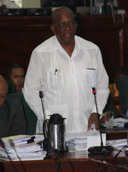 Finance Winston Jordan during his presentation on the Fiscal Management and Accountability (Amendment) Bill 2015 in the National Assembly on Thursday. (Keno George photo)