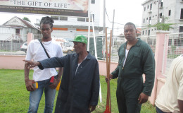 A few of the persons who participated in GPHC’s cleanup exercise inspecting the work
that was done