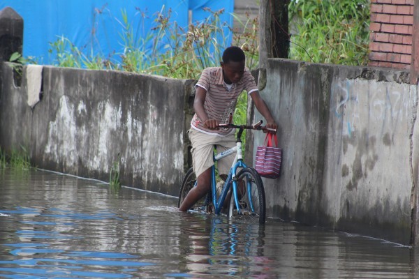 Biking against the tide in Albouystown today.
