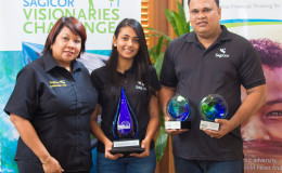 From left are Marliene Chin, Sagicor Life Inc, lead student Athina Indar and supervising teacher, Jerome Rajpersaud.