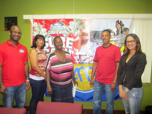 Three of the winners (from left to right) Bunita Singh, Jean Benjamin and Shailendra Arjune are accompanied by TRINCHLORO’s Manager, Padma Prashad (right) and Consumer Goods Brand Rep. Randal Gibbs (left).