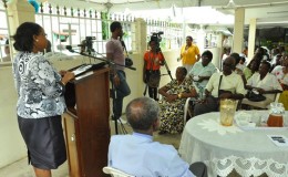 A section of the gathering being addressed by Minister of Social Protection, Volda Lawrence at the Agricola Care Givers Seniors Recognition day celebrations (GINA photo)