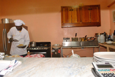 Island style Chef Omar doing his thing in the Kitchen 