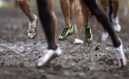 Competitors run during the men’s senior race at the IAAF World Cross Country Championships in Bydgoszcz in this file photo taken on March 28, 2010. REUTERS/PETER ANDREWS