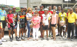 Winners and runners up of this year’s 11th annual Reagan Rodrigues road race pose with their winning spoils with Hassan Mohamed and members of the Rodrigues’ family. (Orlando Charles photo)
