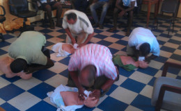 Parika/Bartica practising CPR during the training