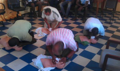 Parika/Bartica practising CPR during the training