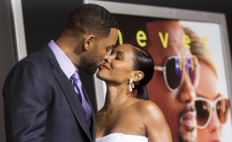 Cast member Will Smith and his wife Jada Pinkett Smith kiss at the premiere of ‘’Focus’’ at the TCL Chinese theatre in Hollywood, California February 24, 2015. (Reuters/Mario Anzuoni)
