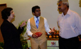 Director of Trinidad and Tobago Fine Cocoa Company Ltd Ashley Parasram, centre, chief technical ­officer—Ministry of Food Production Audine Mootoo and Davinan Ramraj, ­agricultural officer 1, at Tueday’s launch of the cocoa company at the Hilton Trinidad, St Ann’s. 