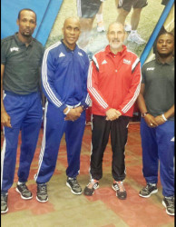 Guyana’s FIFA accredited Instructors/Assessors Abdullah Hamid (left), Stanley Lancaster (2nd left), and Trevor Beckles (right) posing with FIFA referee development senior manager Fernando Tresaco (2nd from right) during their FIFA Futuro 111 Course held for CONCACAF officials in Montego Bay, Jamaica.
