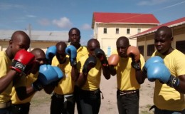 The NOC boxers along with Coach, Lawrence Kellman 