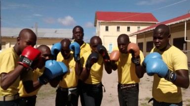 The NOC boxers along with Coach, Lawrence Kellman 