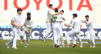 England bowler Mark Wood celebrates with teammates after bowling Australia batsman Nathan Lyon to win the 4th test match and the Ashes during day three of the Fourth Investec Ashes Test at Trent Bridge, Nottingham.