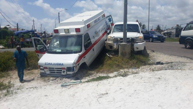 Two persons were injured after the St Joseph Mercy Hospital ambulance and the pick-up truck collided along the Better Hope Public Road yesterday.  (See story on page 20)