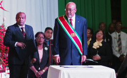 Suriname’s President Desi Bouterse, re-elected to a second, five-year term, attends his swearing-in ceremony in Paramaribo, Suriname, Wednesday, Aug. 12, 2015.
