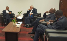 President David Granger (left)  and Foreign Affairs Minister, Carl Greenidge (second from right), Guyana’s Ambassador to Suriname, Keith George (right) and Secretary General, of the Union of South American Nations (UNASUR) Dr. Ernesto Samper Pizano, in discussion earlier today, in Paramaribo, Suriname. (Ministry of the Presidency photo)