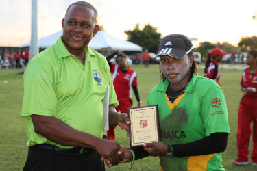 Player of the match: Player of the match in the Jamaica, Trinidad women’s encounter on August 12, Chedean Nation receiving a plaque from the umpire after her fine all-round performance. WICB Media/Ash Allen Photography