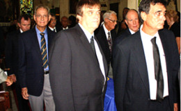 Local cricket commentator Tony Cozier left) was one of the pall bearers to take Short out of the church.
