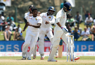 Rangana Herath is all fired up after getting the wicket of Ajinkya Rahane. 