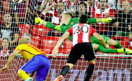 Athletic Bilbao’s Aritz Aduriz heads the ball to score against Barcelona.
