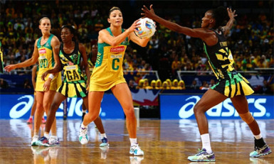 Kim Ravaillion looks to pass past Jamaica’s Paula Thompson during the 2015 Netball World Cup semi-final match between Australia and Jamaica.  