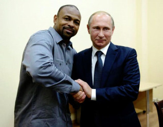 Roy Jones Jr (left) and Vladimir Putin 