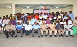 Commissioner of Police, Seelall Persaud and divisional commander, Stephen Mansell and others pose with the graduates