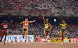Shelly-Ann Fraser-Pryce (JAM), second from right, wins the womens 100m in 10.76 during the IAAF World Championships in Athletics at National Stadium. From left: Tori Bowie (USA), Dafne Schippers (NED), Fraser-Pryce and Veronica Campbell-Brown (JAM). Kirby Lee-USA TODAY...
