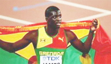 Kirani James celebrates following his bronze medal in the men’s 400m here yesterday.