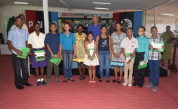 President David Granger and recipients of the 2015 Burnham Education Scholarship Trust, (B.E.S.T) Bursary awards at Congress Place, Sophia, during a ceremony, in honour of their achievements at the recently concluded National Grade Six Assessment (GINA photo)