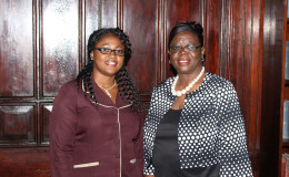 New Registrar of Lands, assistant, sworn-in: Rosalie Roberts (at right) and Wendella Austin were respectively sworn-in as Registrar and Assistant Registrar of the Land Registry yesterday at a simple ceremony before Acting Chief Justice Ian Chang at the Supreme Court. In taking their oaths, they swore to faithfully execute the duties of the offices to which they have been appointed. (Photo by Keno George)  