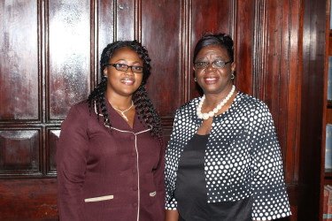 New Registrar of Lands, assistant, sworn-in: Rosalie Roberts (at right) and Wendella Austin were respectively sworn-in as Registrar and Assistant Registrar of the Land Registry yesterday at a simple ceremony before Acting Chief Justice Ian Chang at the Supreme Court. In taking their oaths, they swore to faithfully execute the duties of the offices to which they have been appointed. (Photo by Keno George) 
