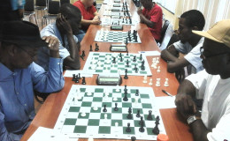 Chess players competing for honours during the 2015 Forbes Burnham Memorial Chess Tournament which ends today at the National Racquet Club on Woolford Avenue. Leaders after three rounds of the competition are Roberto Neto, Anthony Drayton and Taffin Khan.