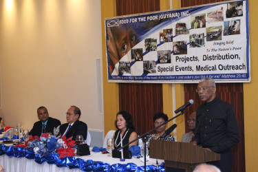 President David Granger addressing Food for the Poor (Guyana) Incorporated’s fundraising dinner on Friday evening at the Pegasus Hotel. Seated at the head table (from left) are Food for the Poor (Guyana) CEO Kent Vincent, Chairman of the Board of Directors Paul Chan-A-Sue and First Lady Sandra Granger and others. (Photo by Keno George)