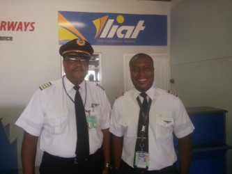 Cameron Handley Sam along with his son Cameron Handley Sam Jnr, who became the first father and son to co-pilot a LIAT aircraft together. 