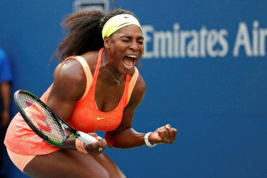 New York, NY, USA; Serena Williams of the United States reacts after winning the first set against Kiki Bertens of the Netherlands (not pictured) on day three of the 2015 U.S. Open tennis tournament at USTA Billie Jean King National Tennis Center yesterday. (Reuters)   