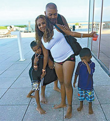 Trinidadian Lyndon Shane Beharry, his common law wife Amanda Morris and their two children, Brandon and Brian, in a family photo. Beharry and his family died in a fire in New Jersey Tuesday, but officials believe it may have been deemed murder/suicide. PHOTO: COURTESY THE BEHARRY FAMILY: ASBURY PARK PRESS