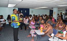 Minister within the Ministry of Social Protection Simona Broomes addressing the staff
members (GINA photo)
