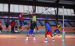 Some of the volleyball players going through their paces yesterday at the National Gymnasium. (Orlando Charles photo)