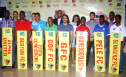 The eight captains of the participating teams of the Guyana Football Federation’s upcoming Elite League pose for a photo opportunity at Saturday’s launch. (Orlando Charles photo)