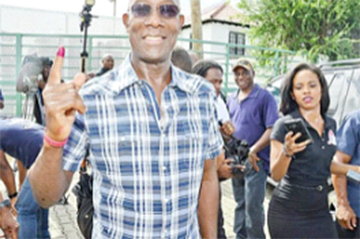 Dr Keith Rowley is all smiles after voting at the International School, Westmoorings, yesterday. (Photo: Trinidad Express/Ishmael Salndy)