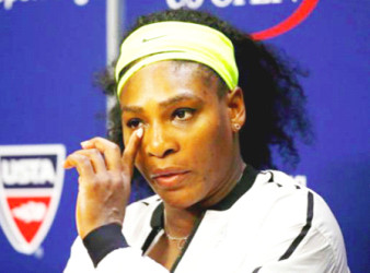 Serena Williams of the U.S. listens to a reporter’s question during a post-match press conference following her loss to Roberta Vinci of Italy in their women’s singles semi-final match at the U.S. Open Championships tennis tournament in New York yesterday. 