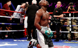 UNDEFEATED! Floyd Mayweather sinks to his knees in the middle of the ring following his final fight against Andre Berto Saturday night which he won to end his career unbeaten. (Fightnews photo)