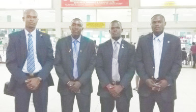 Guyana’s FIFA accredited referees from left to right Trevor Porter, Sherwin Johnson, Sherwin Moore and Venton Mars pose for a photo opportunity prior to their departure from the Cheddi Bharrat Jagan International Airport for the United States of America.