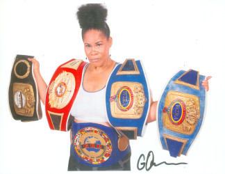 Gwendolyn O’Neil sporting the five belts she won during her career. 