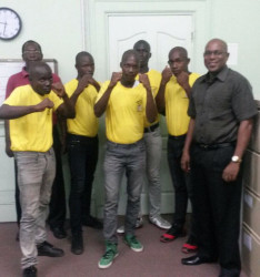 The NOC boxers pose for a photo with GBA President Steve Ninvalle during the courtesy call on Wednesday. 