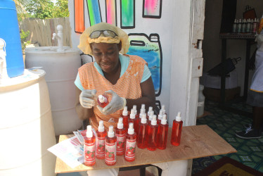 Claudette’s daughter Roxanne Beresford labeling the product