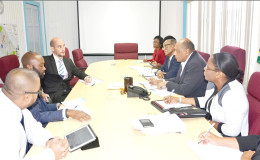 Minister of Governance with responsibility for Natural Resources and the Environment Raphael Trotman and the Commonwealth team at the meeting
