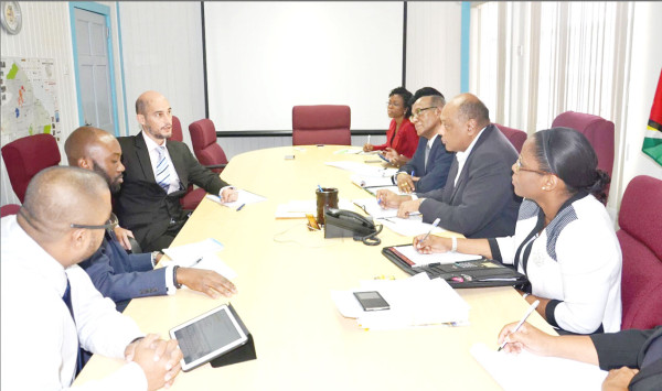 Minister of Governance with responsibility for Natural Resources and the Environment Raphael Trotman and the Commonwealth team at the meeting  